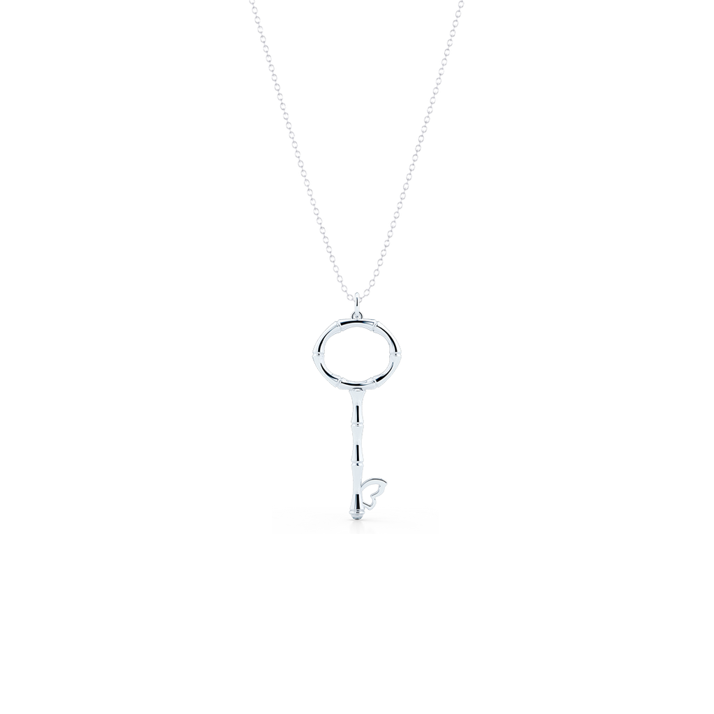 White gold key best sale pendant