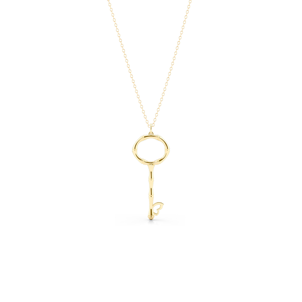 Bamboo inspired, Yellow Gold Key Pendant. Delicate Butterfly accent. Hand-fabricated in sustainable, solid, 14K Gold. Key pendants are a classic jewelry statement for girls of all ages. Free Shipping for All US Orders. 15 Day Returns | BASHERT JEWELRY | Boca Raton Florida