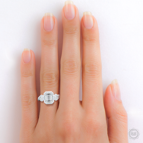 Three stone Moissanite engagement ring. Emerald Cut Forever One Moissanite by Charles & Colvard. Pear shape side stone Moissanites. Handcrafted in White Gold or Precious Platinum. Free Shipping on All USA Orders. 30-Day Returns | BASHERT JEWELRY | Boca Raton, Florida