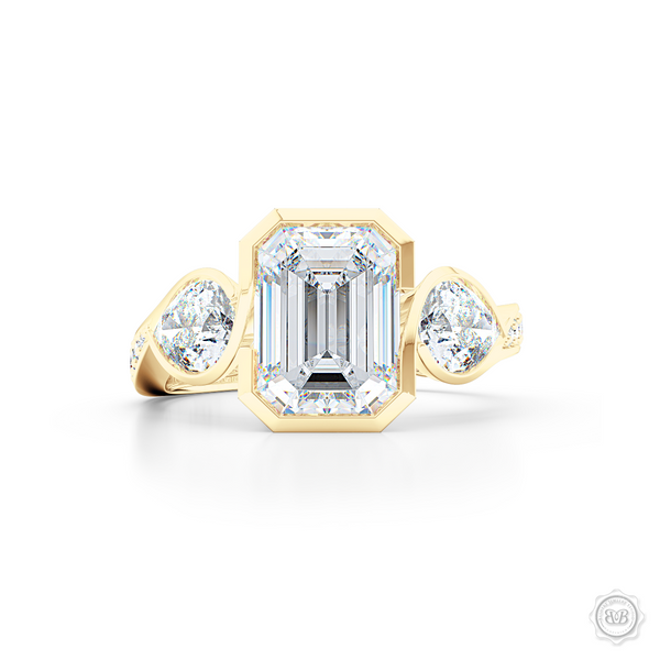Three stone Moissanite engagement ring. Emerald Cut Forever One Moissanite by Charles & Colvard. Pear shape side stone Moissanites. Handcrafted in Classic Yellow Gold. Free Shipping on All USA Orders. 30-Day Returns | BASHERT JEWELRY | Boca Raton, Florida
