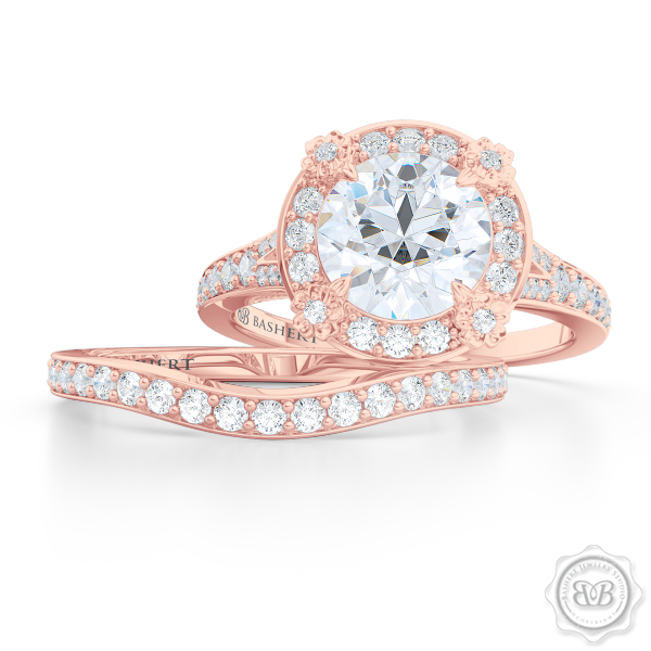 Award-Winning Round Halo Engagement Ring, crafted in Romantic Rose Gold and round brilliant Moissanite by Charles & Colvard. Signature Floret Prongs, Encrusted with Round Diamonds. Dazzling Baby-Split Bead-Set Shoulders. Free Shipping USA. 30Day Returns | BASHERT JEWELRY | Boca Raton Florida