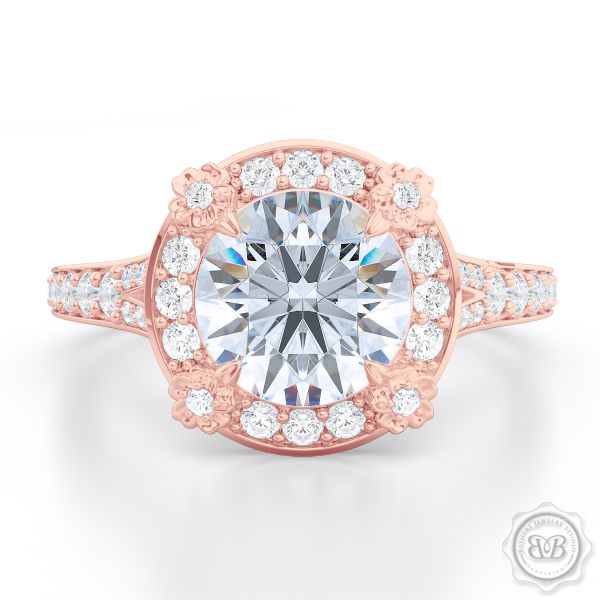 Award-Winning Round Halo Engagement Ring, crafted in Romantic Rose Gold and round brilliant Moissanite by Charles & Colvard. Signature Floret Prongs, Encrusted with Round Diamonds. Dazzling Baby-Split Bead-Set Shoulders. Free Shipping USA. 30Day Returns | BASHERT JEWELRY | Boca Raton Florida